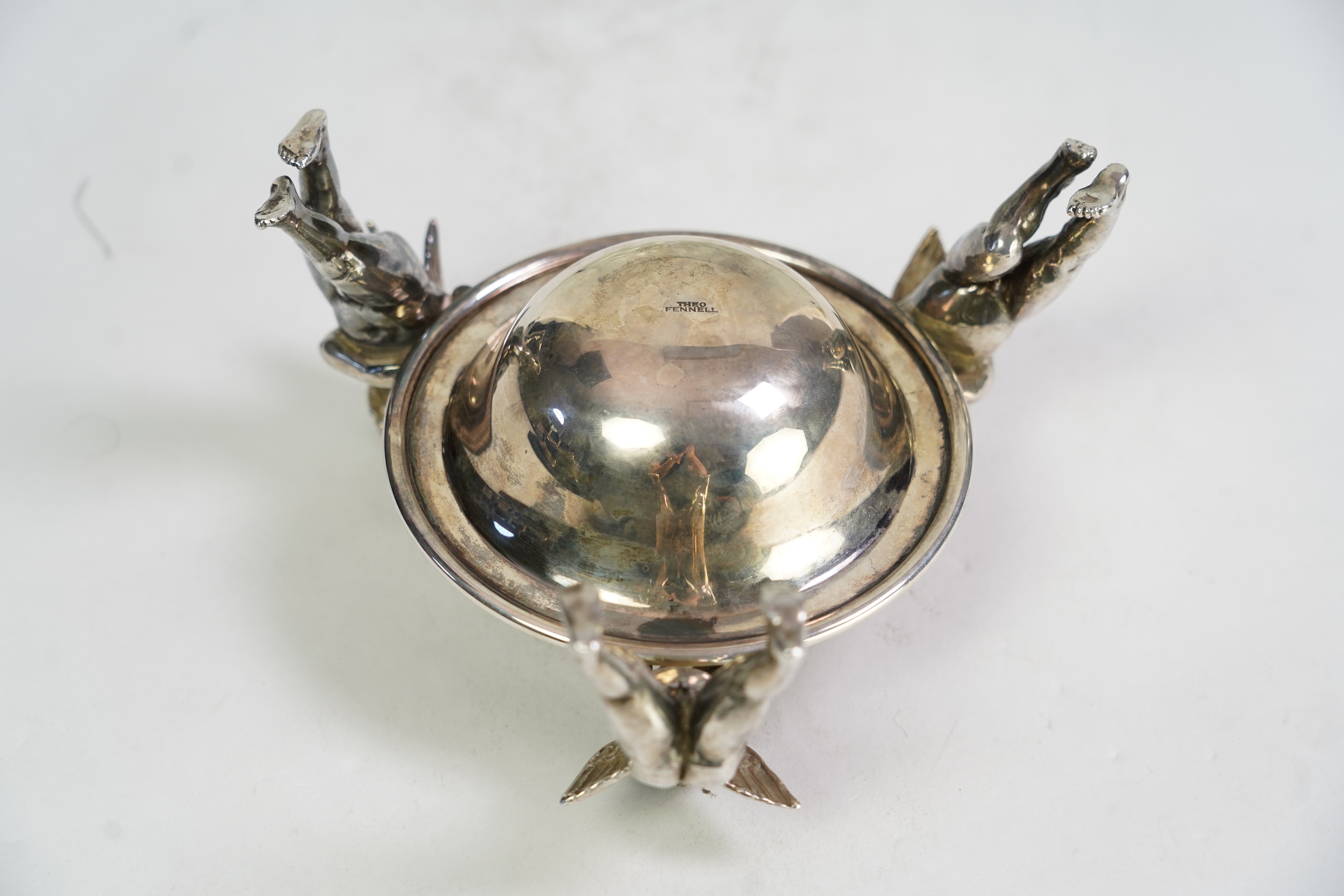 An Elizabeth II Theo Fennell silver bonbon bowl, with three cherub supports